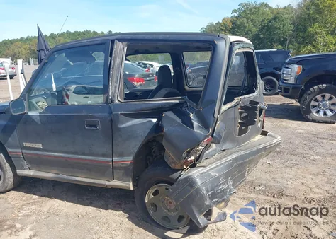 1994 Geo Tracker from USA, damaged, VIN 2CNBJ18U7R6928021